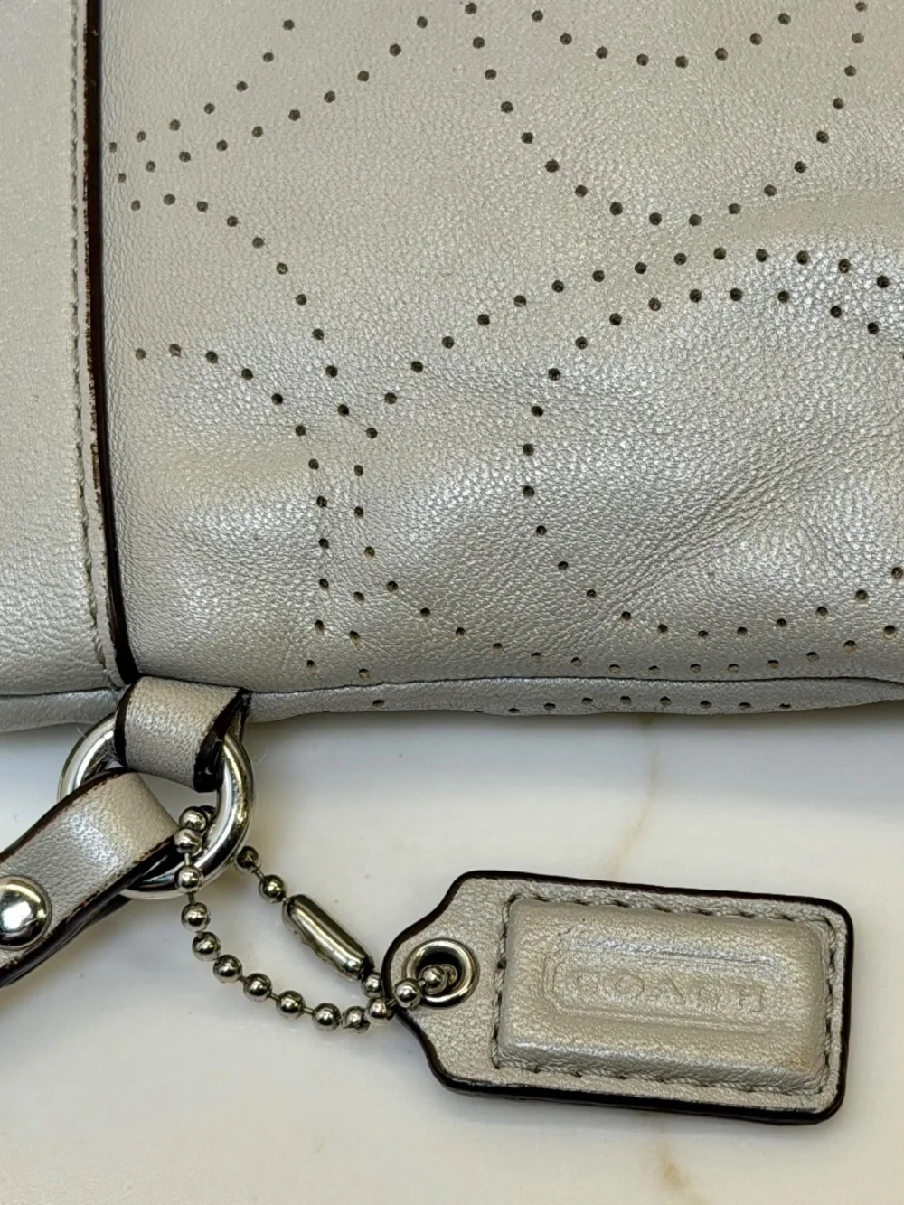 Coach Pearl Grey Perforated Logo Insignia Leather Wristlet F45561